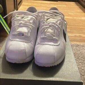 White Nike Cortez with Black Swoosh